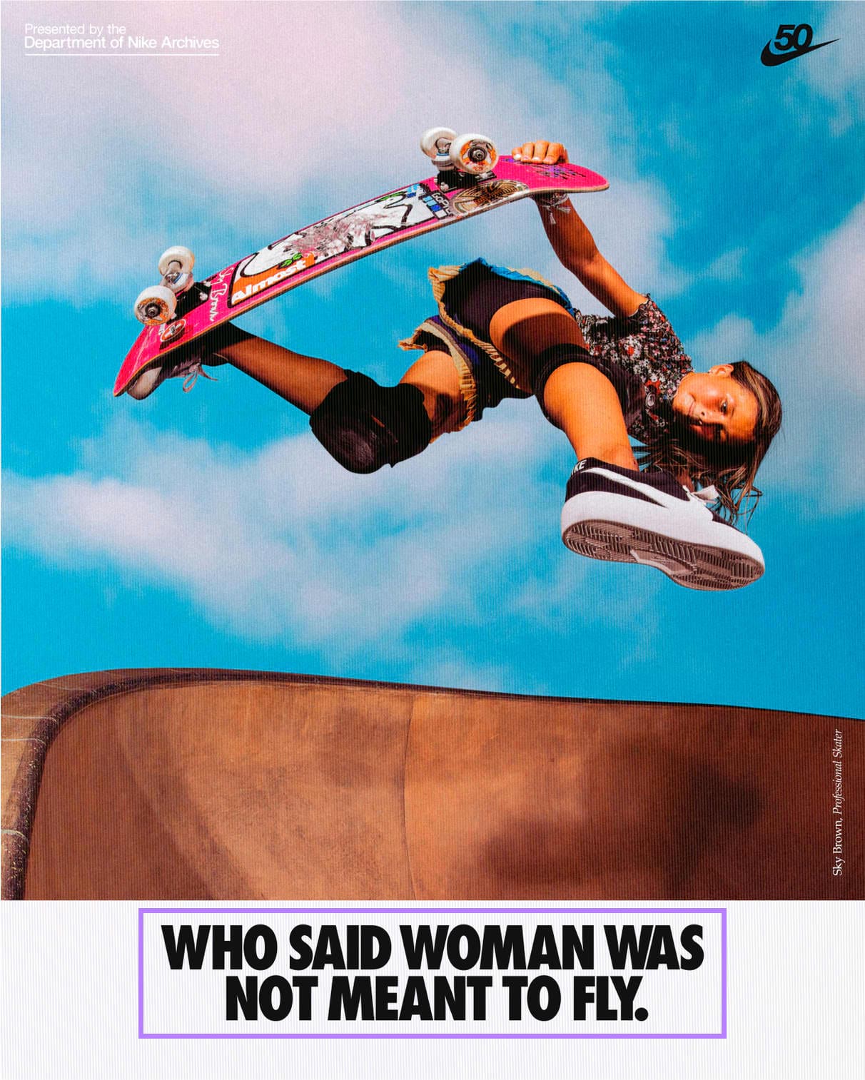 An ad from Nike campaign featuring a girl on a skate with "who said woman was not meant to fly." copy